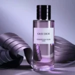 Dior Gris Dior Eau De Parfum 100ml bottle with grey ribbons on lilac