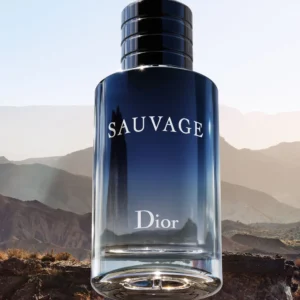 Dior Sauvage Eau De Toilette 100ml bottle in front of desert mountains