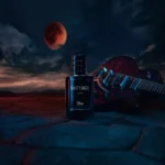 Dior Sauvage Elixir 100ml bottle on rocks under a night sky
