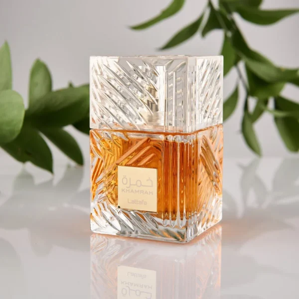 Lattafa Khamrah Eau De Parfum 100ml bottle with green leaves